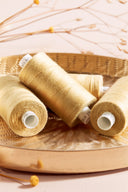 Mustard overlock bobbin x 4