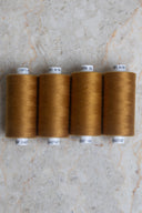 Ochre overlock bobbin x 4