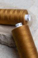 Ochre overlock bobbin x 4