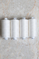 Off-white overlock bobbin x 4