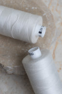 Off-white overlock bobbin x 4