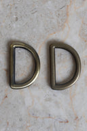 Passants demi rond 30 mm doré vieilli x 2