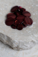 Another close-up of the buttons on the marbled beige stone, from a different angle.