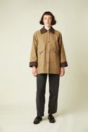 Barn Jacket pattern – front view, camel jacket burgundy velvet collar, black trousers, black loafers – Atelier Brunette
