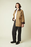 Barn Jacket pattern – 3/4 front view, camel jacket burgundy velvet collar, white t-shirt, grey jeans – Atelier Brunette