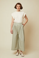 Culotte Skirt pattern – front view, culotte skirt sage green high waist, front pleats, white t-shirt – Atelier Brunette