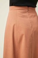 Patron La Jupe – Détail fermeture et couture, jupe terracotta taille haute, version boutonnée – Atelier Brunette
