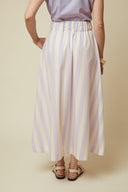 Vertigo Skirt pattern – half-body front view, skirt striped lilac, pockets – Atelier Brunette