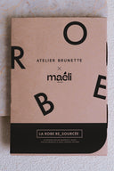 RE_SOURCÉE Dress pattern – envelope kraft Atelier Brunette x Maéli, the RE_SOURCÉE dress, pink-tinted background – Atelier Brunette