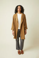 Troublante Jacket pattern – half-body portrait front view, colourway caramel, crossed stand collar – Atelier Brunette