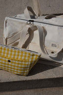 Escapade Pack pattern – travel bag and bum bag yellow gingham, zip fastener, stone background – Atelier Brunette