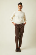 Carrot Trousers pattern – Full length front view, trousers chocolate brown, cream crew-neck jumper, derby shoes brown – Atelier Brunette