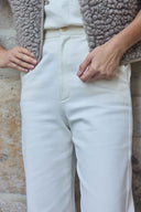 Trousers pattern – waistband shot, trousers bootcut ivory high waist, grey teddy waistcoat, stone background – Atelier Brunette