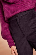 Trousers pattern – waistband shot, trousers bootcut burgundy high waist, fuchsia jumper, beige background – Atelier Brunette