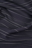 La Rayure 007 navy fabric with fine ecru horizontal stripes, folded flat, with the selvedge visible.